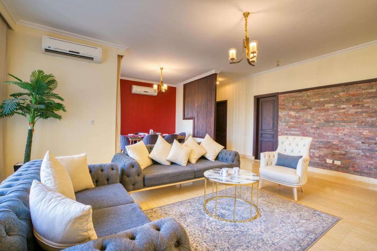 The Suites Near Auc By Elegant Kairo Exterior foto
