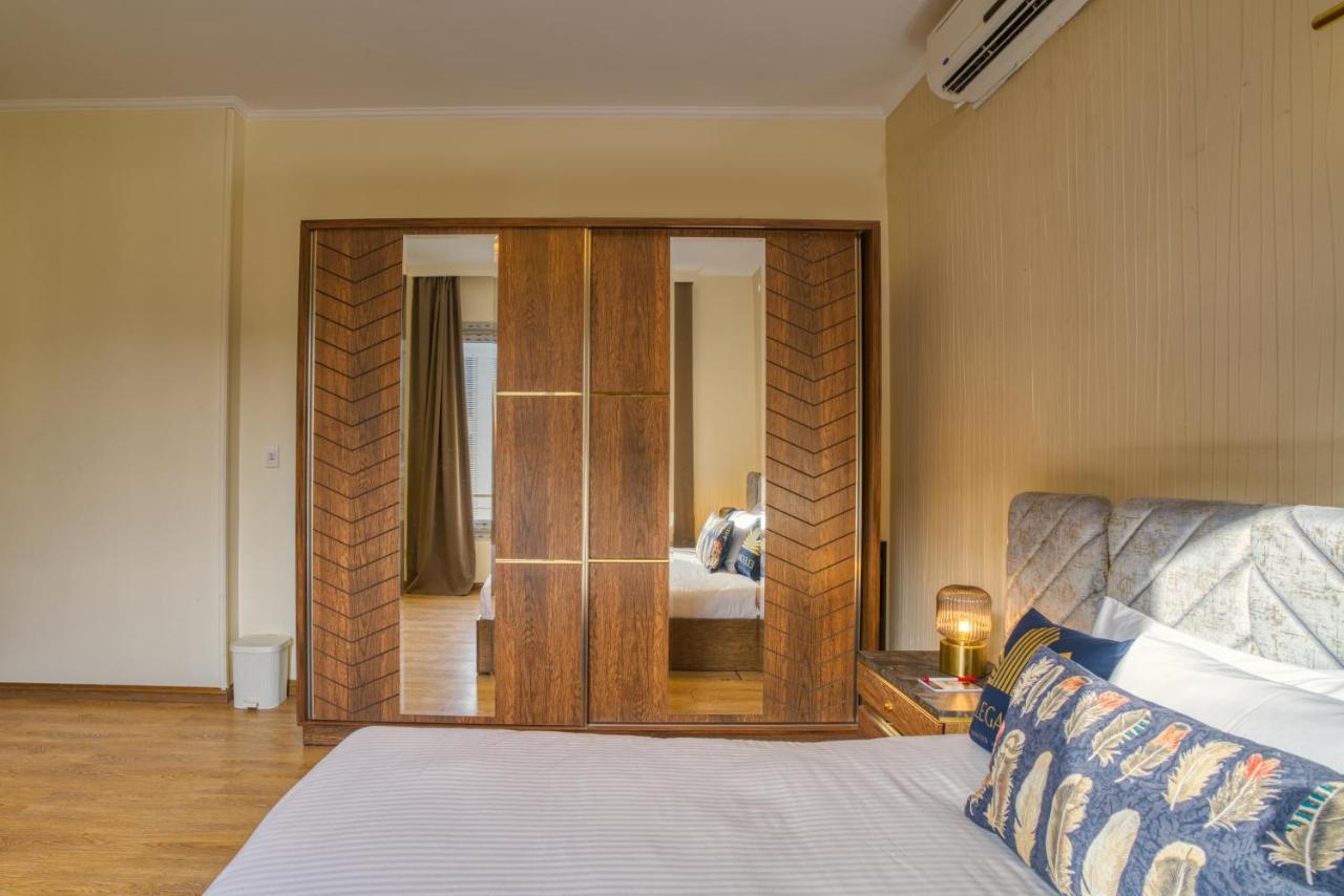 The Suites Near Auc By Elegant Kairo Exterior foto