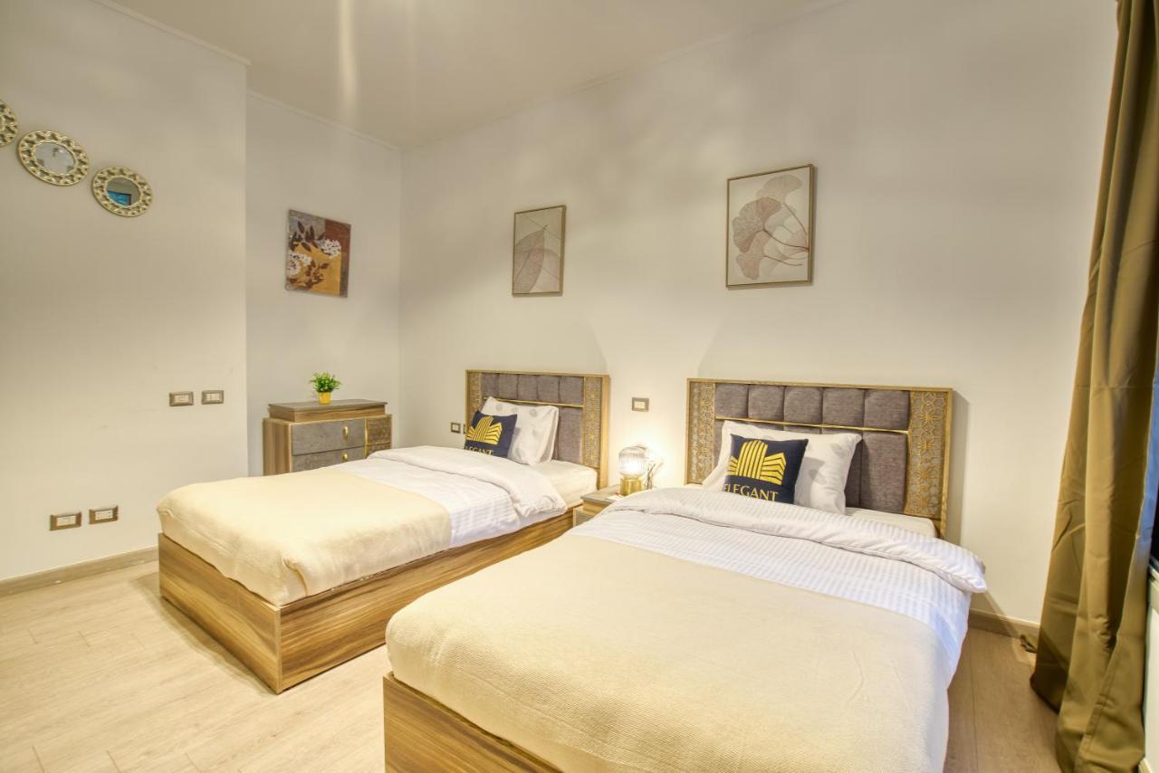 The Suites Near Auc By Elegant Kairo Exterior foto