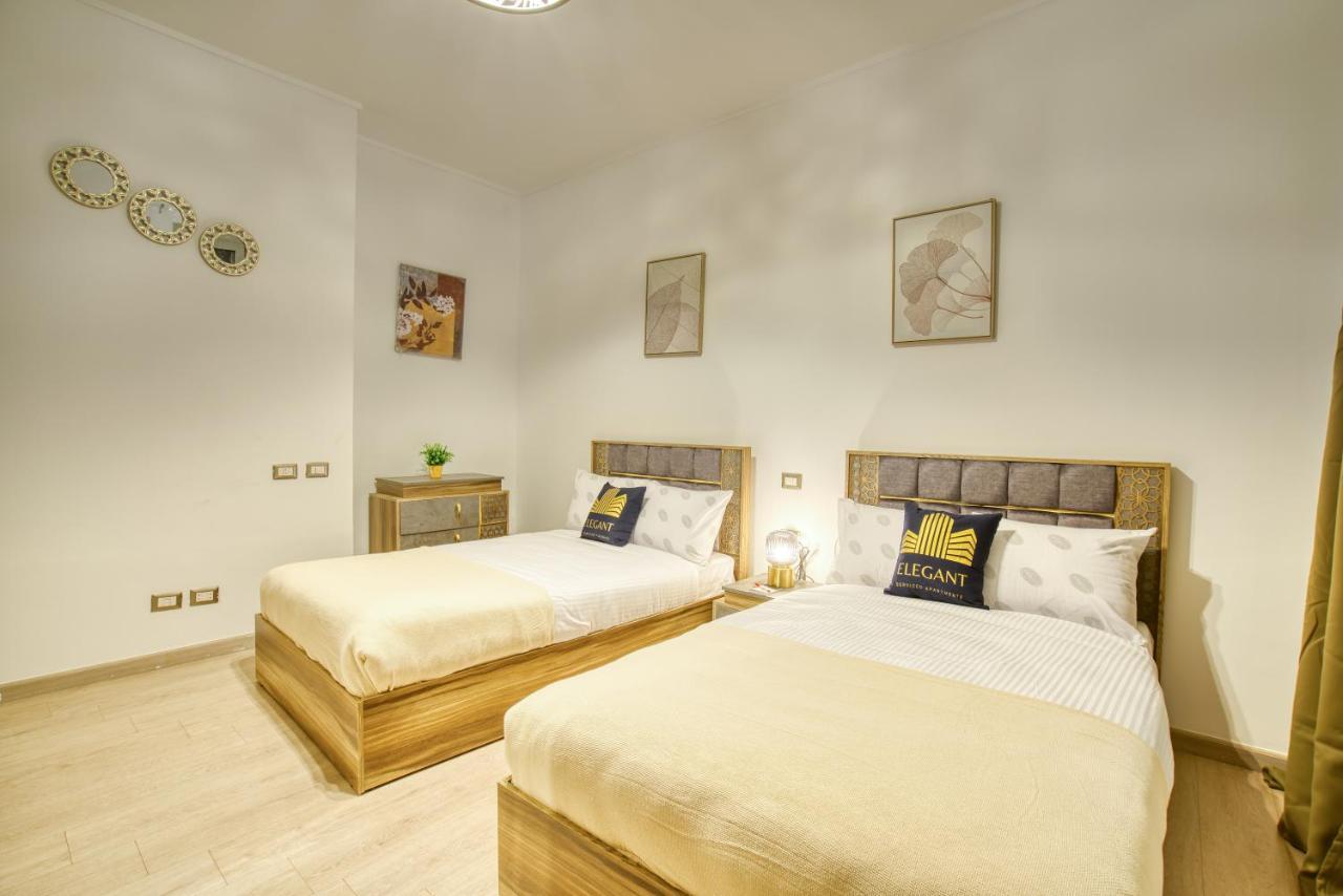 The Suites Near Auc By Elegant Kairo Exterior foto